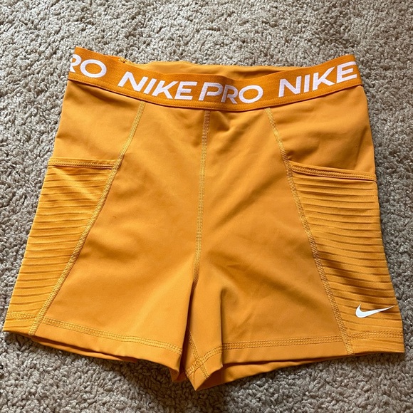 orange nike pros shorts